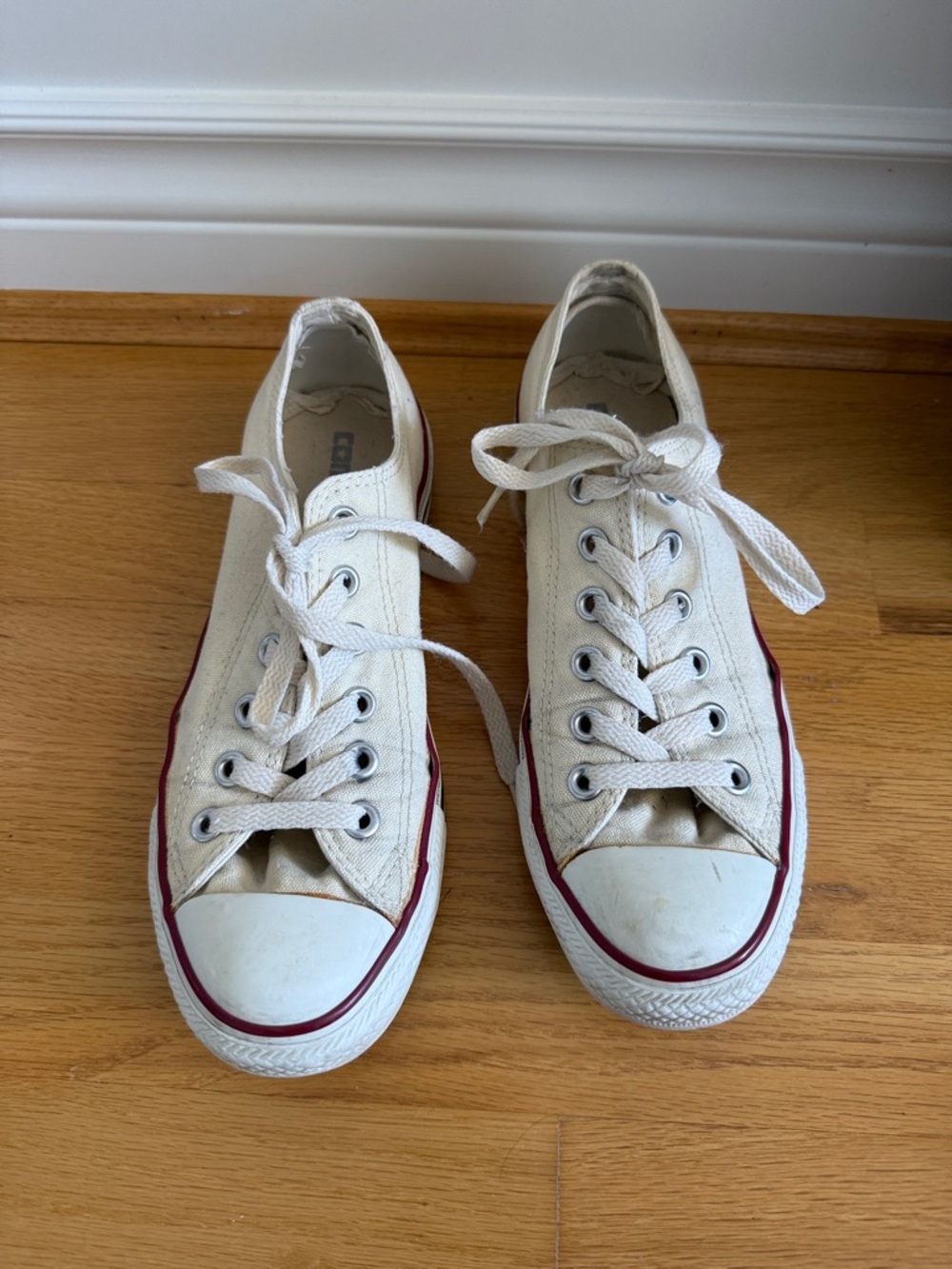 Converse Classic Low Top Canvas Sneakers in Off-White with Red Trim